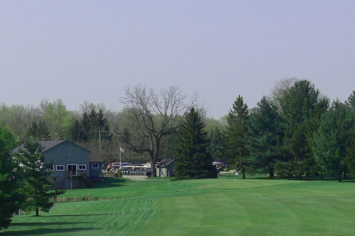 Striped fairway leading to the clubhouse.